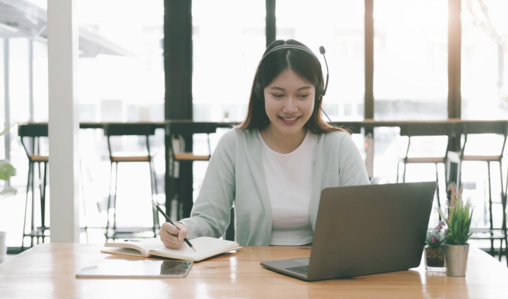 Business owner reviewing financial documents and market analysis